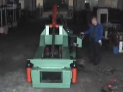 Scrap metal baler